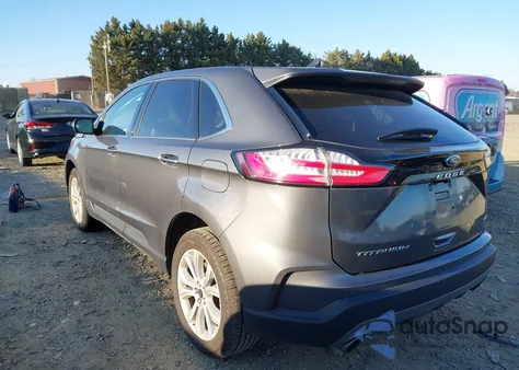 2023 Ford Edge Titanium z USA, uszkodzony, nr VIN 2FMPK4K91PBA19446